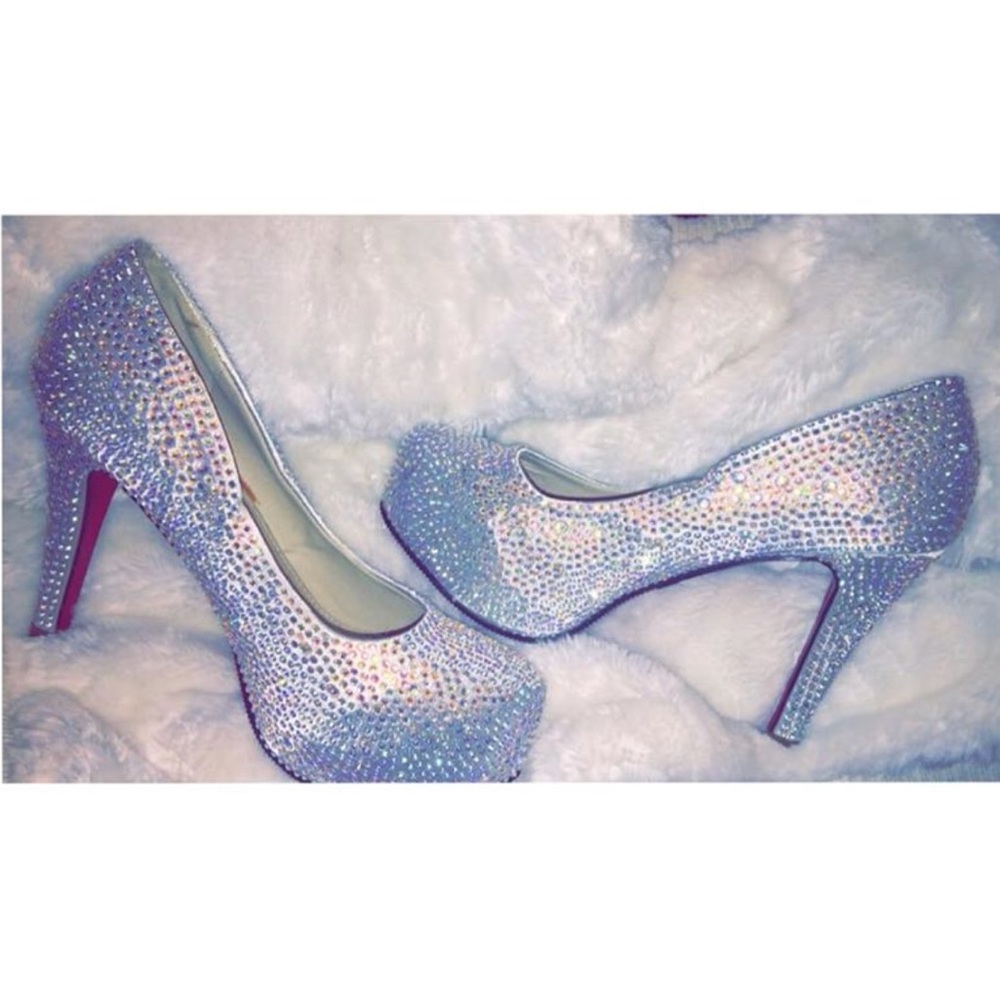 Silver rhinestone heels with red bottoms